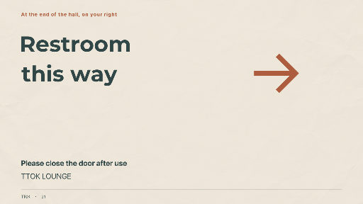 Restroom direction sign